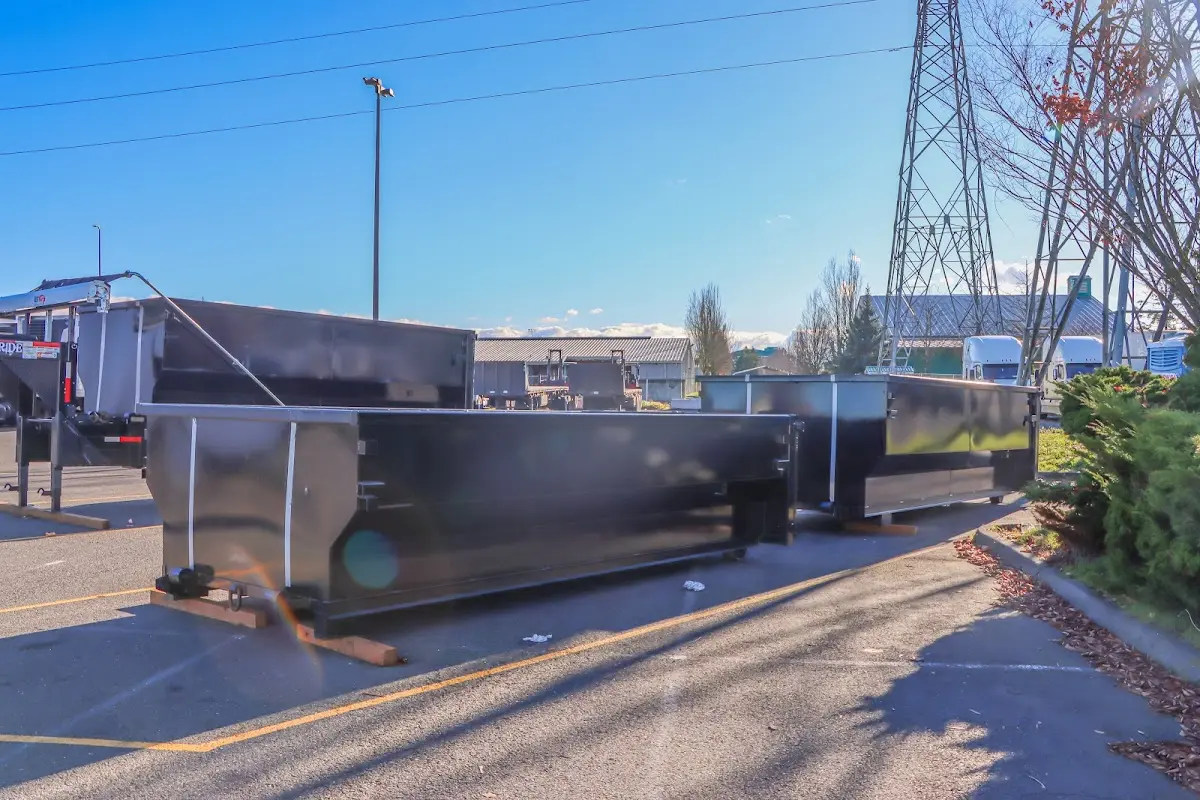 Roll-off dumpster ready for waste disposal at job site for 2 Yard Dumpster Rental in Waltham